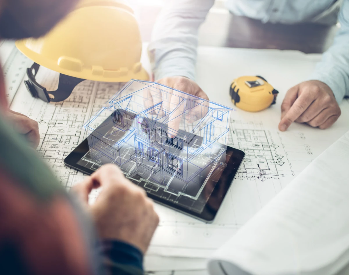 Engineers discussing construction project design